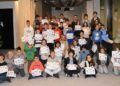 Los 96 Escolares con sus diplomas