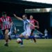 La gimnastica durante una acción de juego en un partido liguero